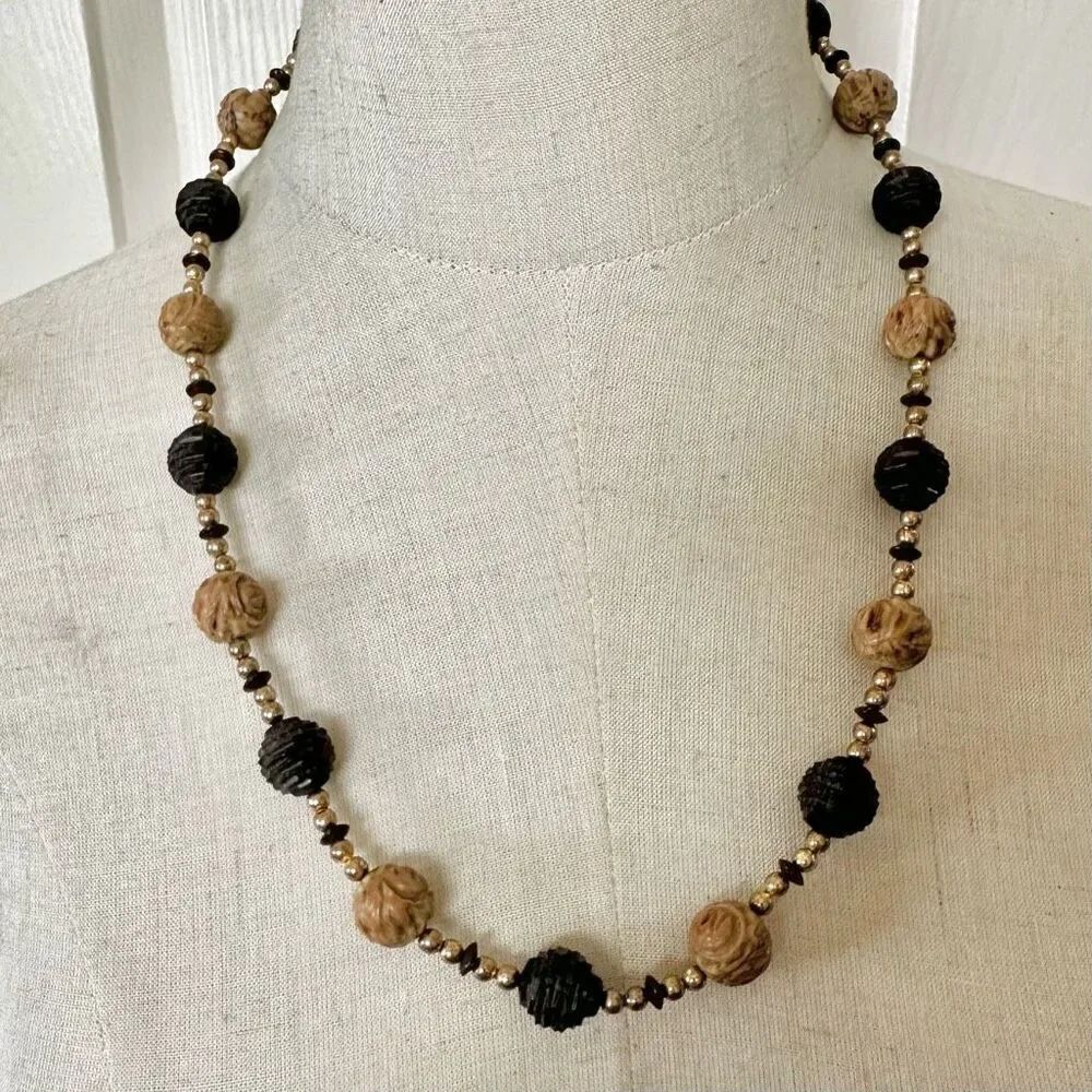 Brown carved bead necklace